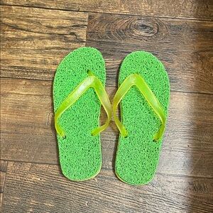 Green and yellow flip flops